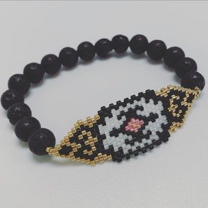 Handmade lava stone and seed beads bracelet